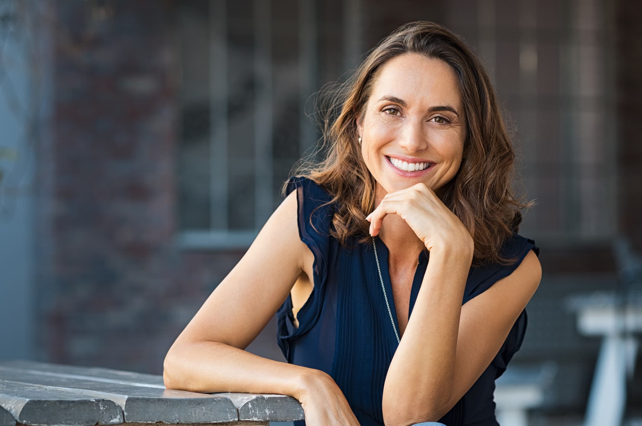 Portrait of a woman navigating midlife — perimenopause/menopause season